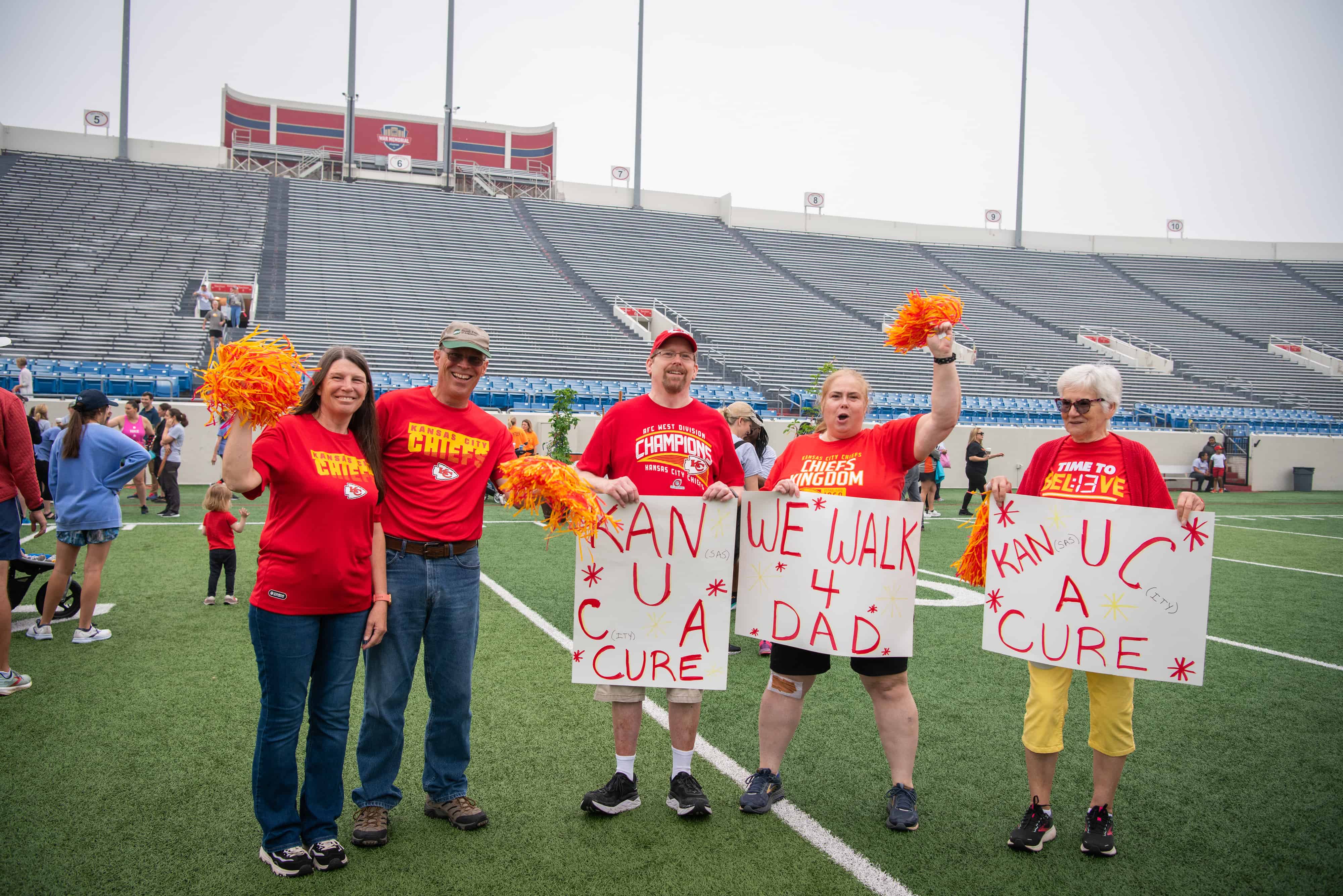 Kansas City Chief fans walking for dad.